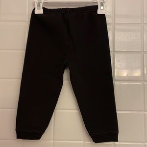 Garanimals sweatpants color black, size 24M. Elastic waistband and ribbed cuffs